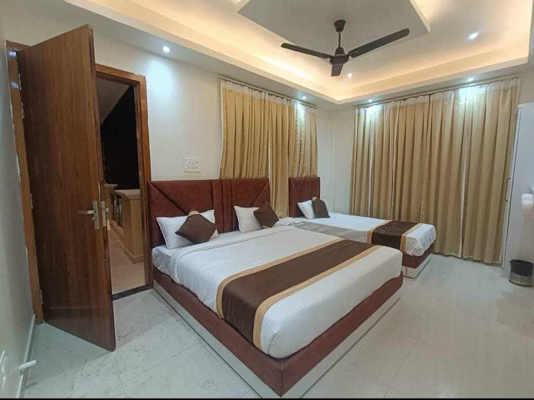 3 Bed Non-AC at Birla Dharmashala Ayodhya — Comfortable room with natural ventilation