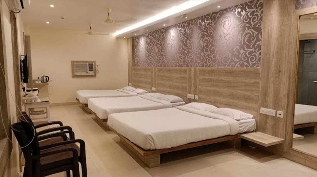Family Room at Birla Dharmashala Ayodhya — Spacious room perfect for families